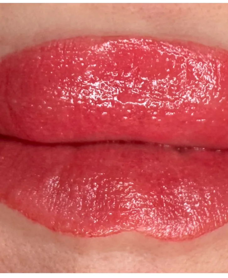 Warm coral lip blush, straight after the appointment